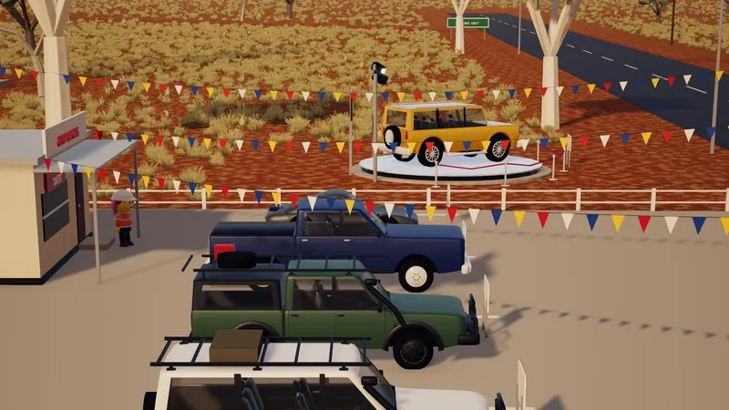 The car yard, the gold one up on its stand